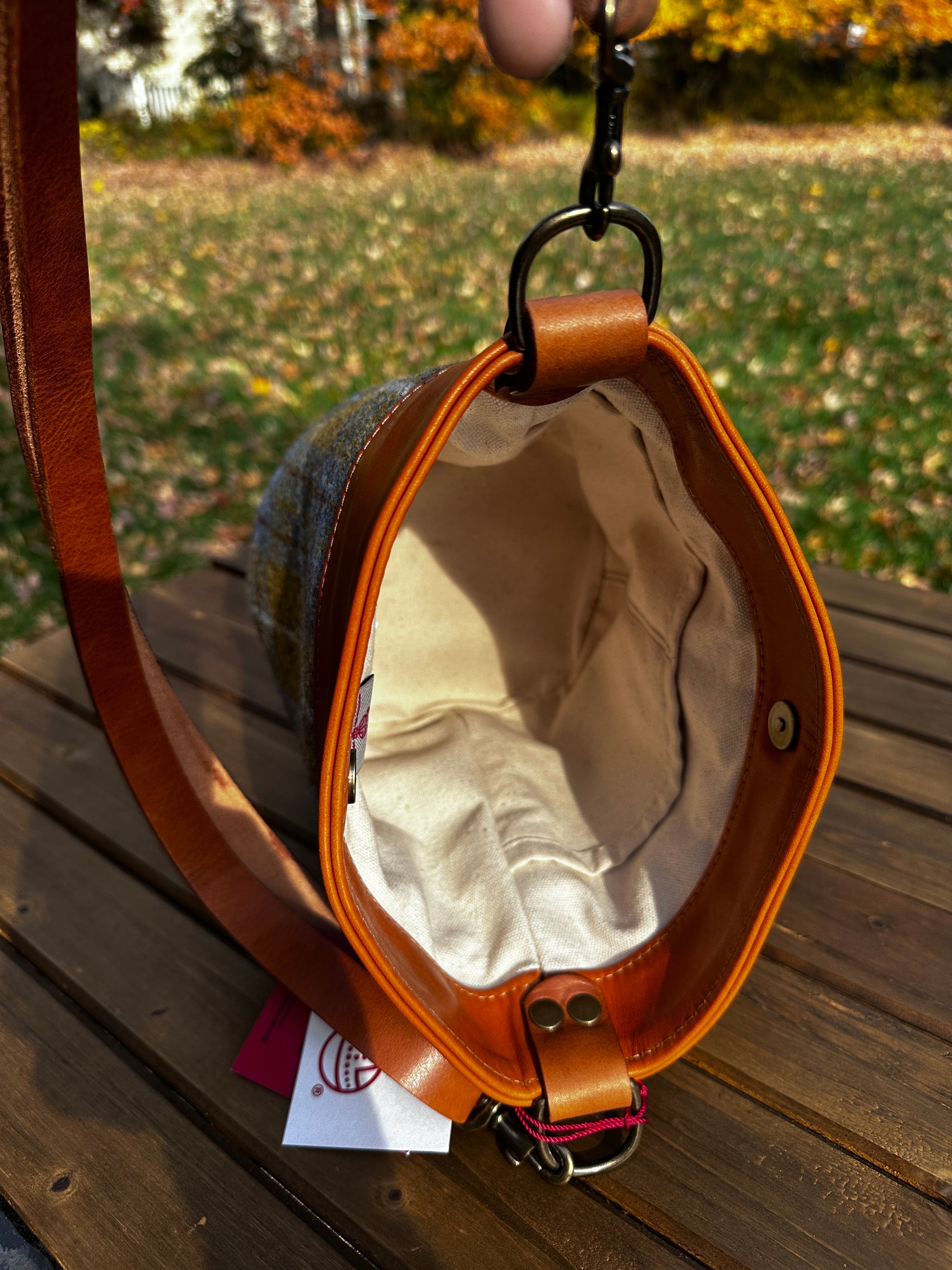 Inside view of the Harris Tweed® Lighthouse Crossbody round bag with flat bottom
