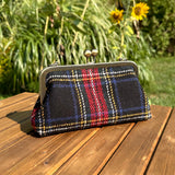 Harris Tweed® kiss lock purse in Stewart Plaid with bronze hardware. Wear as a clutch, attach chain for shoulder or crossbody wear. Holds phone, cards, and small items. Timeless design handcrafted in Maryland. 