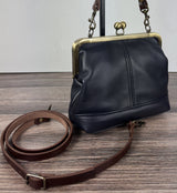 All-leather Princess Anne Kiss Lock Purse with structured base, handbag strap, and detachable crossbody strap — handcrafted in Maryland.