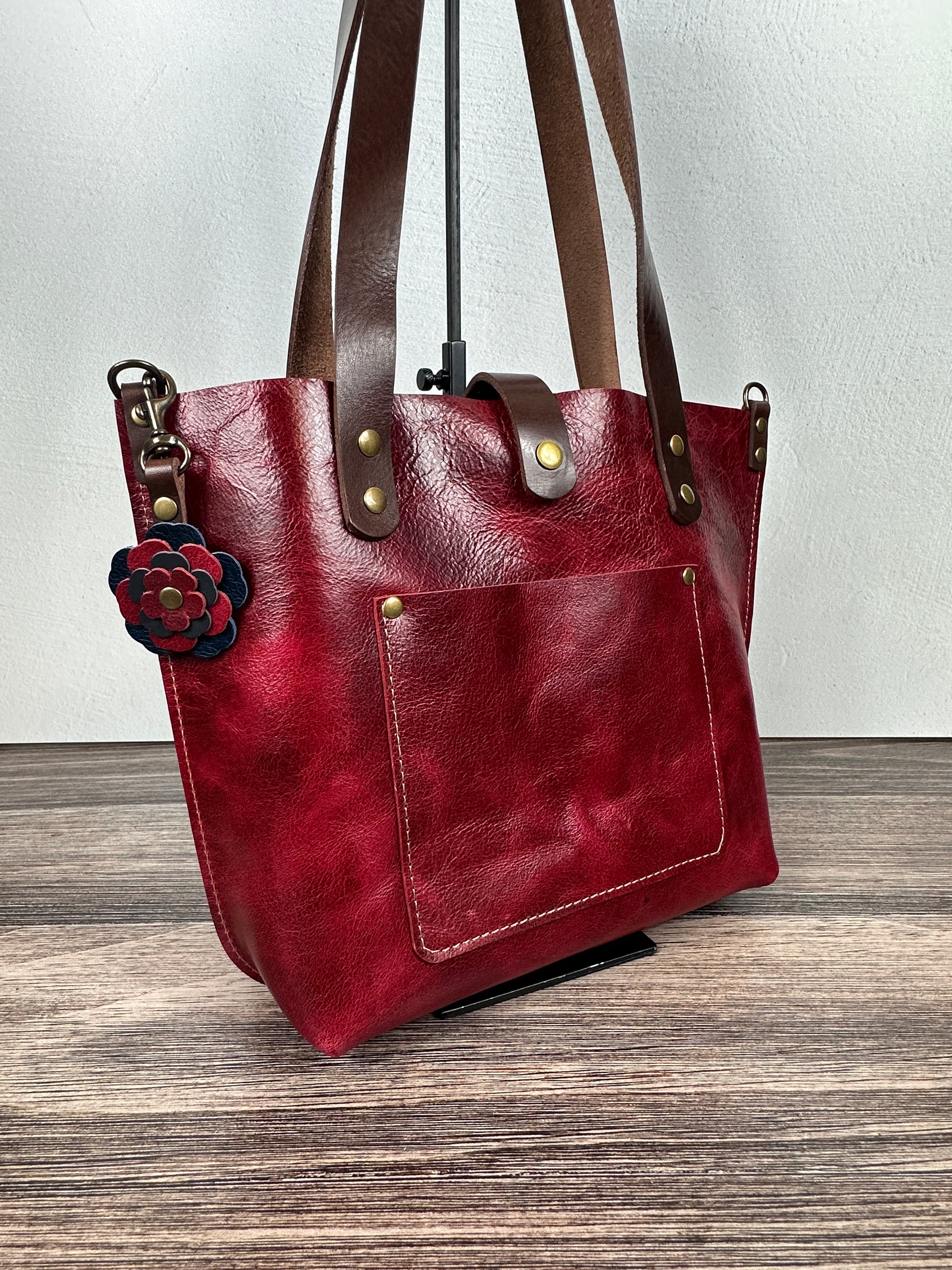 Leather flower bag charm on a Red Leather Shoulder Bag.  