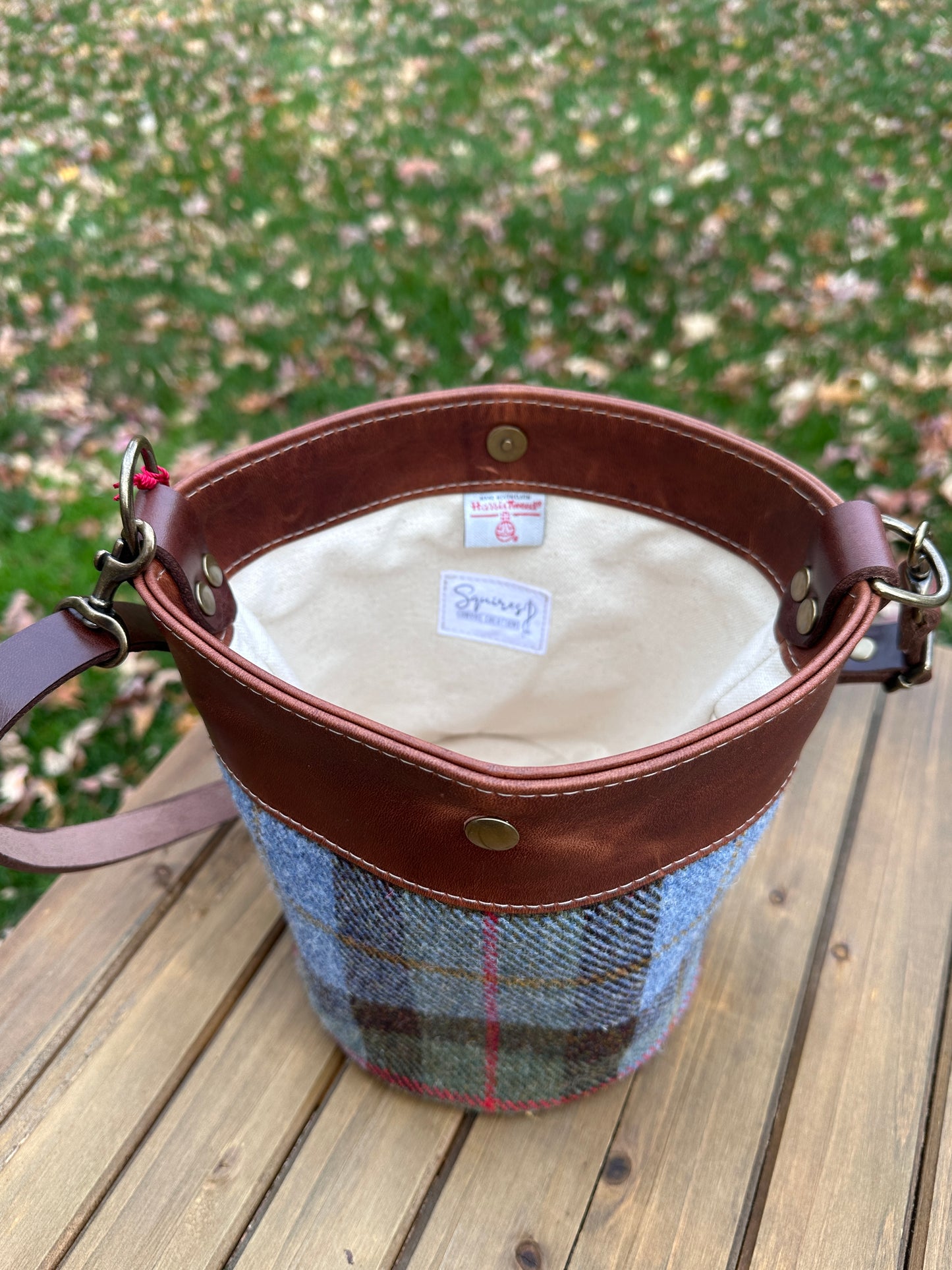 Inside view of the Harris Tweed® Lighthouse Crossbody round bag with flat bottom