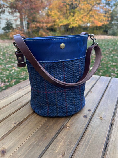 Dark Navy Harris Tweed® Lighthouse Crossbody round bag with flat bottom and Cobalt Blue Leather Accents