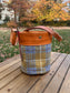 Yellow and Blue Harris Tweed® Lighthouse Crossbody round bag with flat bottom and Acorn Leather Accents