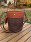 Warm Brown Plaid Harris Tweed® Lighthouse Crossbody round bag with flat bottom and Hybrid Waxed Canvas Accents