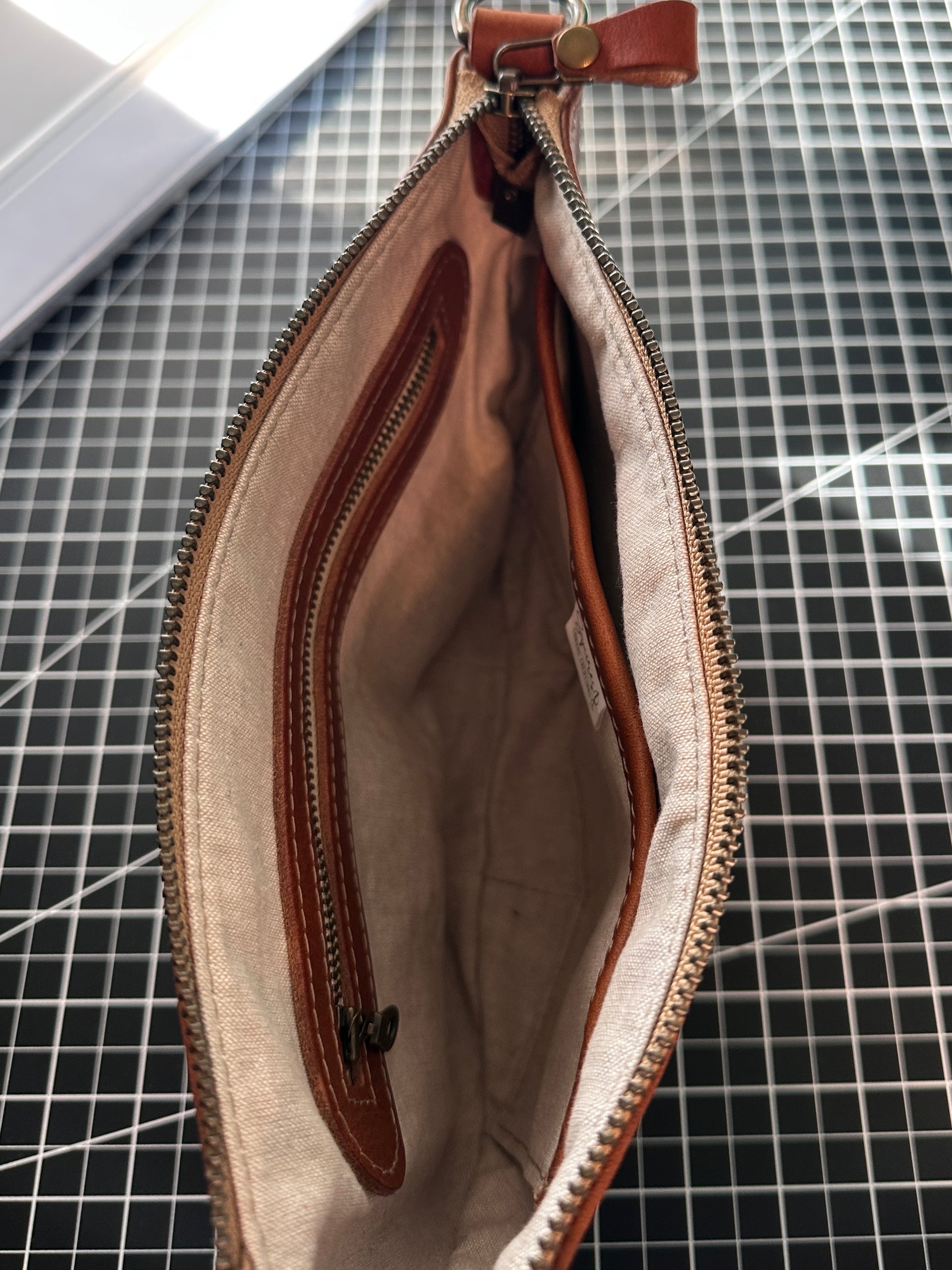 Holland Island Crossbody bag linen interior.