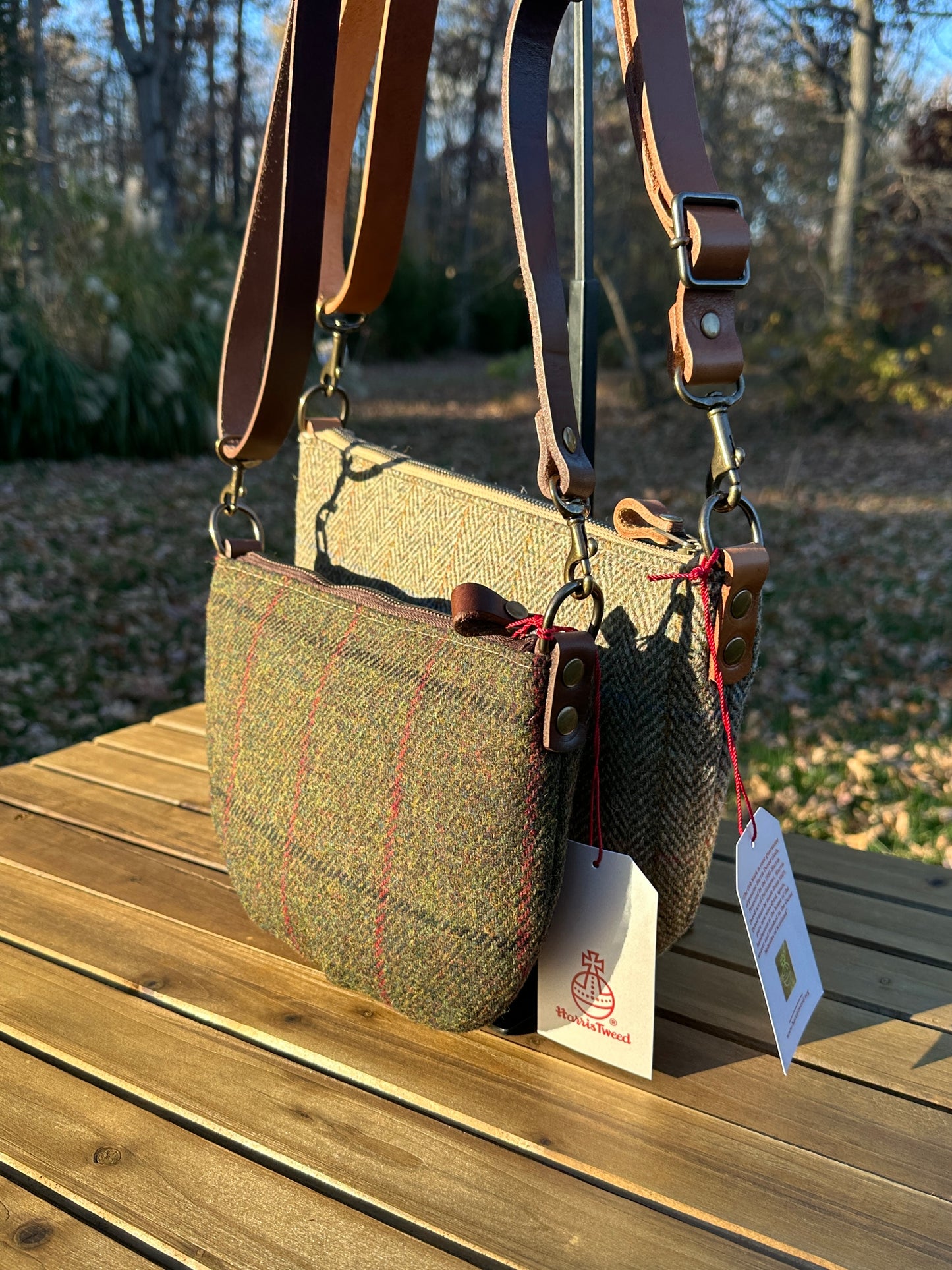 Collection of Holland Island Crossbody bags Green Twill with overcheck Harris Tweed® and Green Herringbone Harris Tweed®.