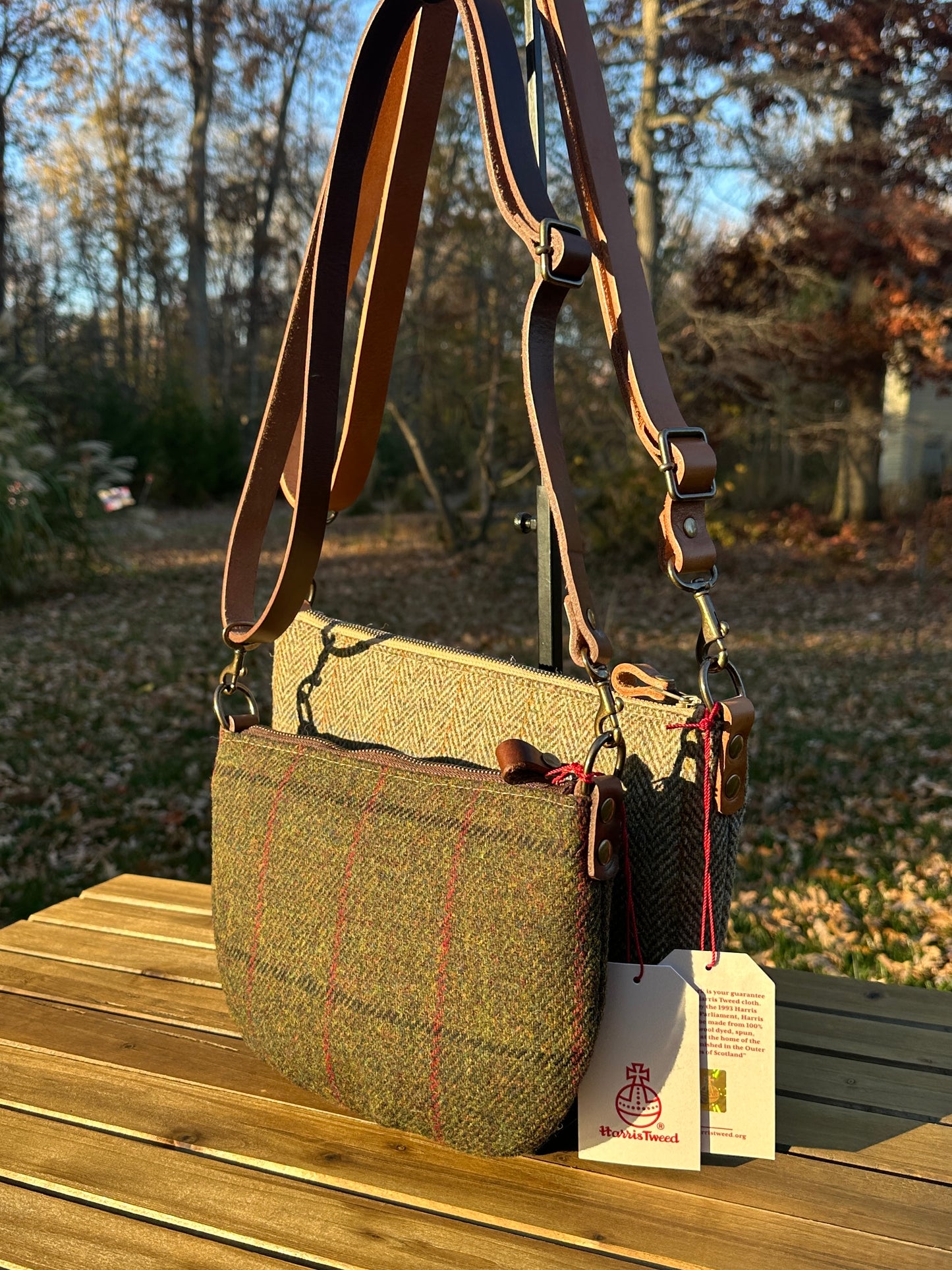 Collection of Holland Island Crossbody bags Green Twill with overcheck Harris Tweed® and Green Herringbone Harris Tweed®.