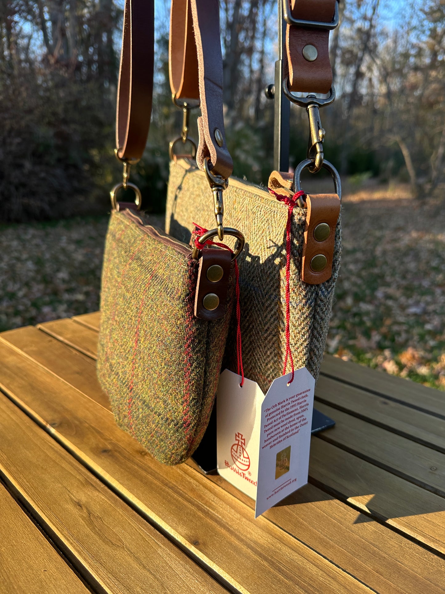 Collection of Holland Island Crossbody bags Green Twill with overcheck Harris Tweed® and Green Herringbone Harris Tweed®.