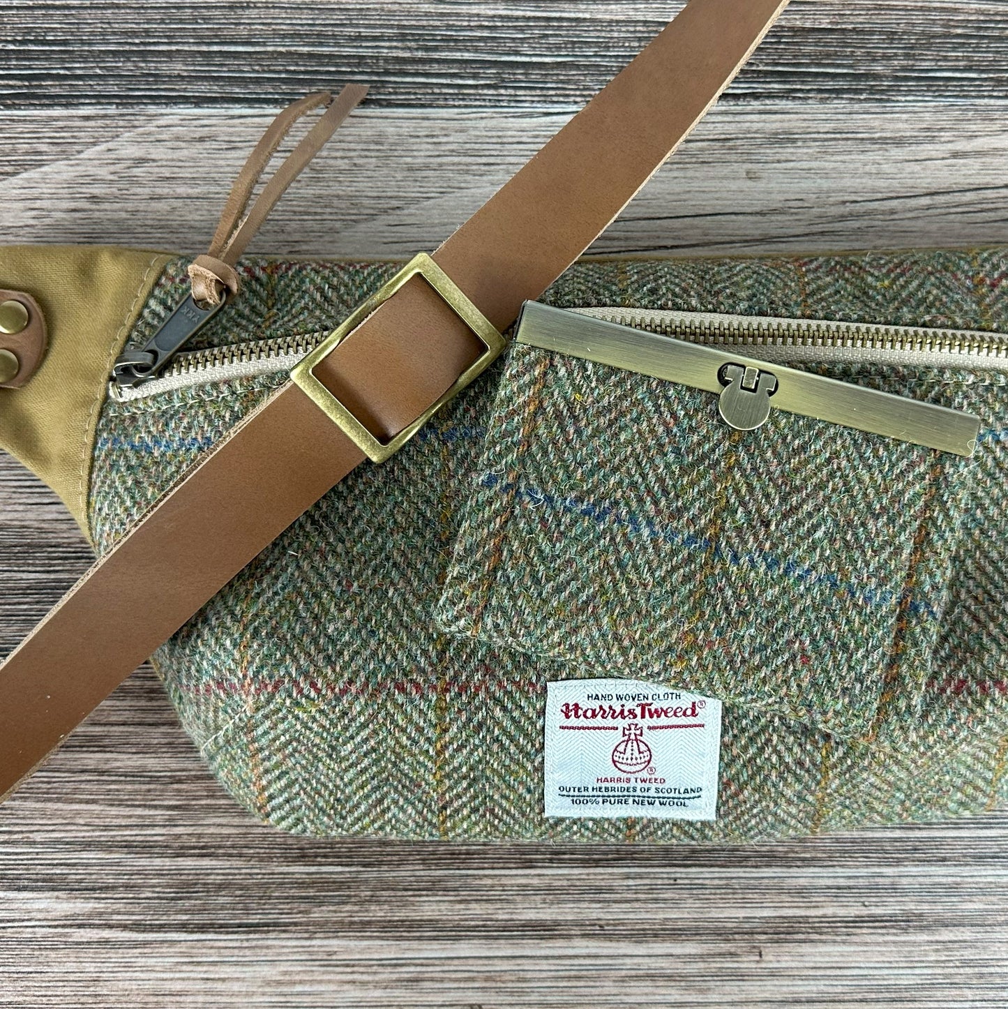 Green Herringbone with Blue & Gold Overcheck Harris Tweed® Wheat Leather Strap Antique Brass Hardware Spinnaker Sling Bag squirescanvascreations.com