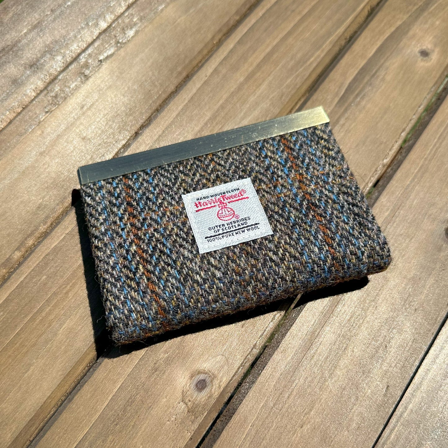 Blue Herringbone with a Rust Overcheck Harris Tweed® with Grey Khaki Interior and Bronze Flip-Lock City Dock Wallet squirescanvascreations.com