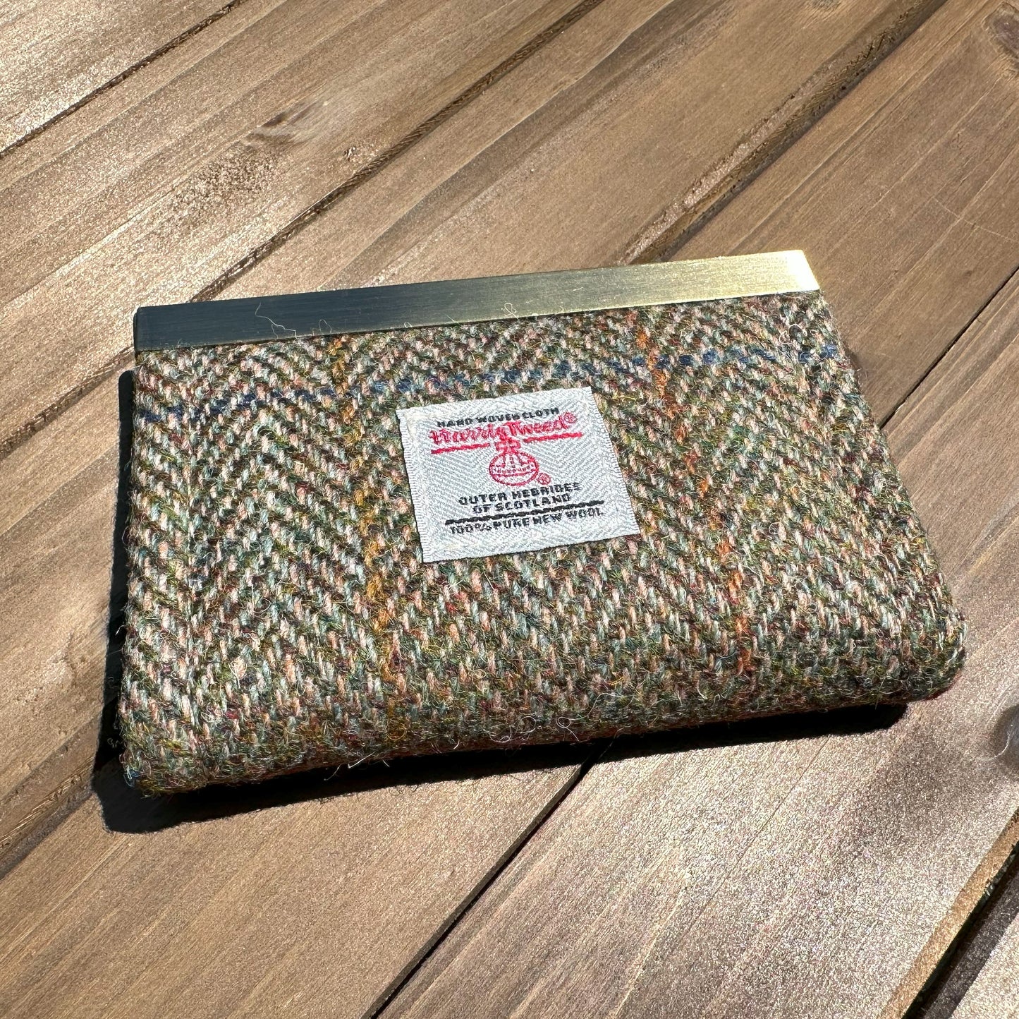 Green and Blue Herringbone with a Rust Overcheck Harris Tweed® with Grey Khaki Interior and Bronze Flip-Lock City Dock Wallet squirescanvascreations.com
