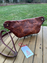 Back View Minimalist sling bag handcrafted with Harris Tweed® and Horween Brown Nut Leather, finished with Antique Brass hardware.
