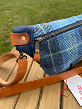 UpClose Minimalist sling bag handcrafted with Blue Plaid Tartan plaid Harris Tweed® and Horween Cobalt Leather, finished with Antique Brass hardware.