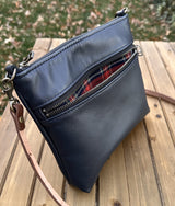 Navy Leather Fairhaven Crossbody with Antique Brass Hardware and Dark Brown Italian Venchetta Leather Strap SquiresCanvasCreations.com