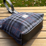 Blue Black and Grey Tartan with Red Overcheck Harris Tweed® and Dark Navy Waxed Canvas back with Solid Brass Hardware Harris Tweed® Eastport Backpack squirescanvascreations.com