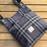 Blue Black and Grey Tartan with Red Overcheck Harris Tweed® and Dark Navy Waxed Canvas back with Solid Brass Hardware Harris Tweed® Eastport Backpack squirescanvascreations.com