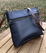 Navy Leather Fairhaven Crossbody with Antique Brass Hardware and Dark Brown Italian Venchetta Leather Strap SquiresCanvasCreations.com