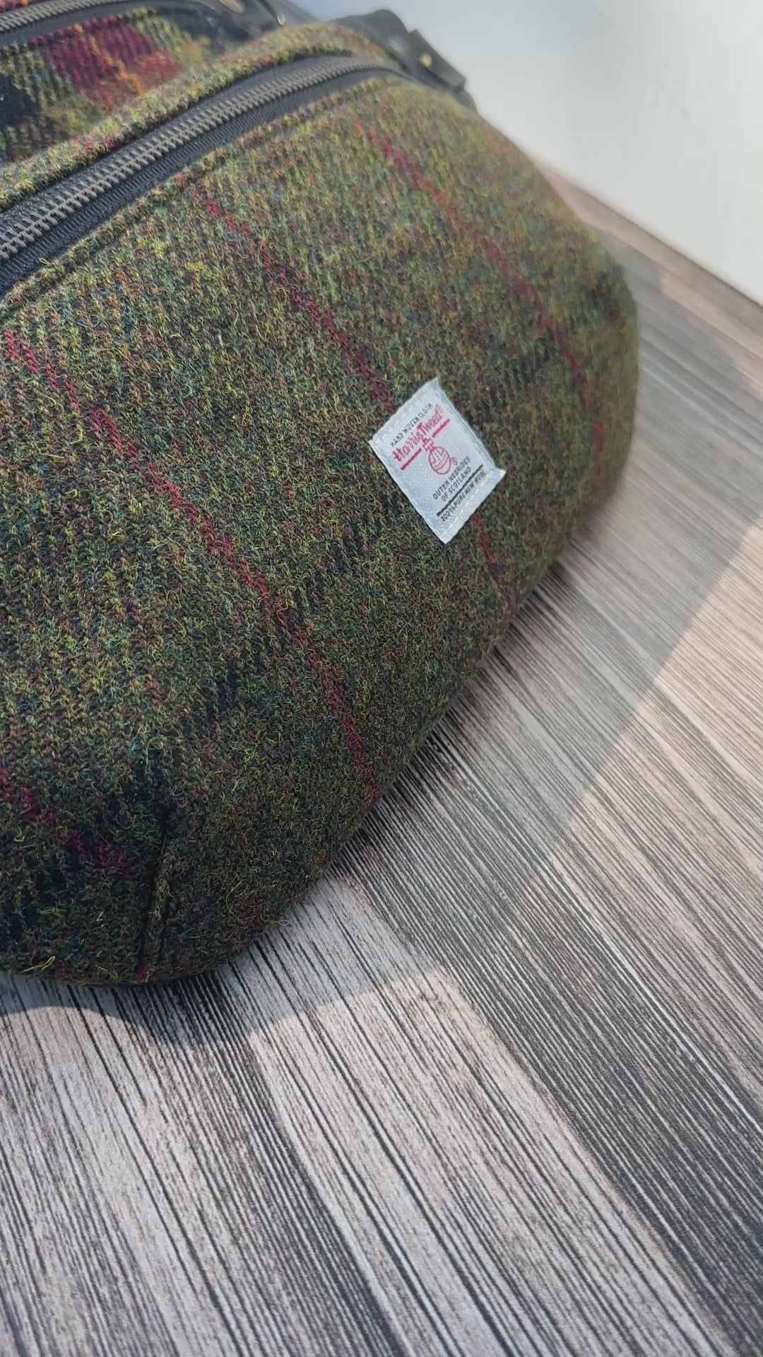 Luxury Harris Tweed® and leather sling bag, handcrafted in Maryland with timeless design.